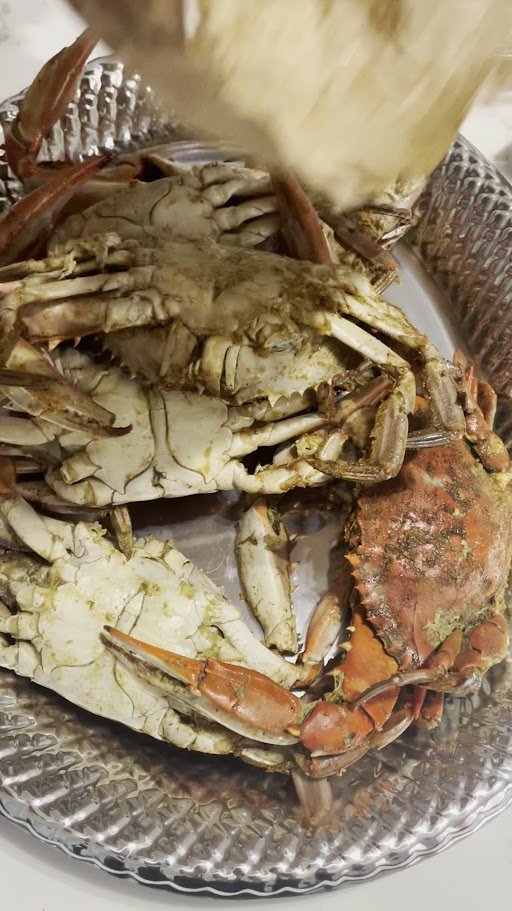 Seafood platters on a restaurant table.