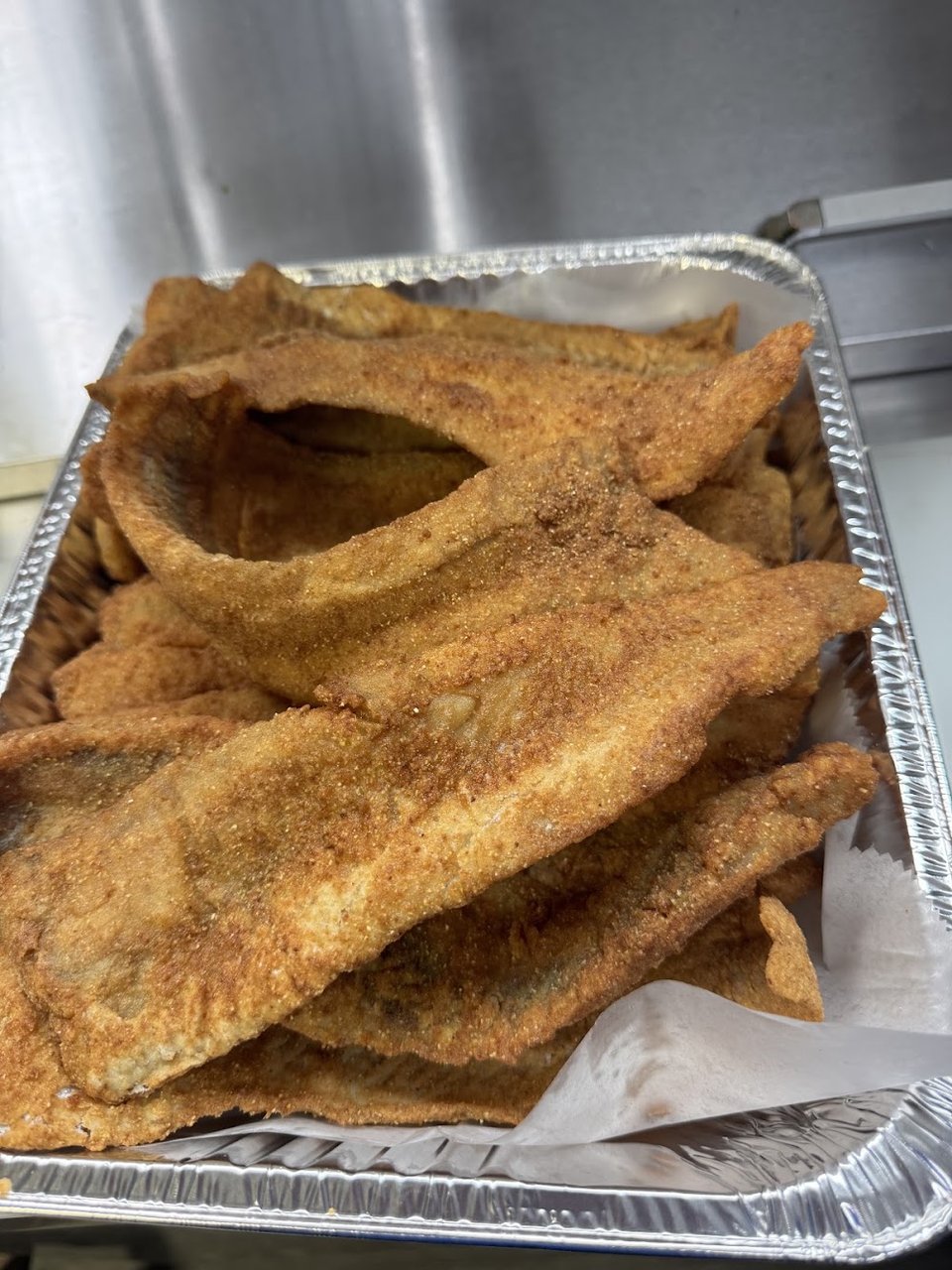 Menu page listing fish and shrimp platters.