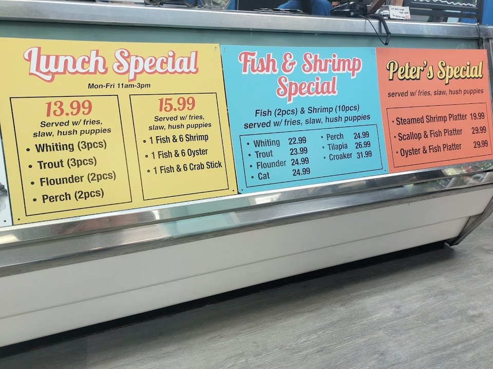Menu page listing fish and shrimp platters.