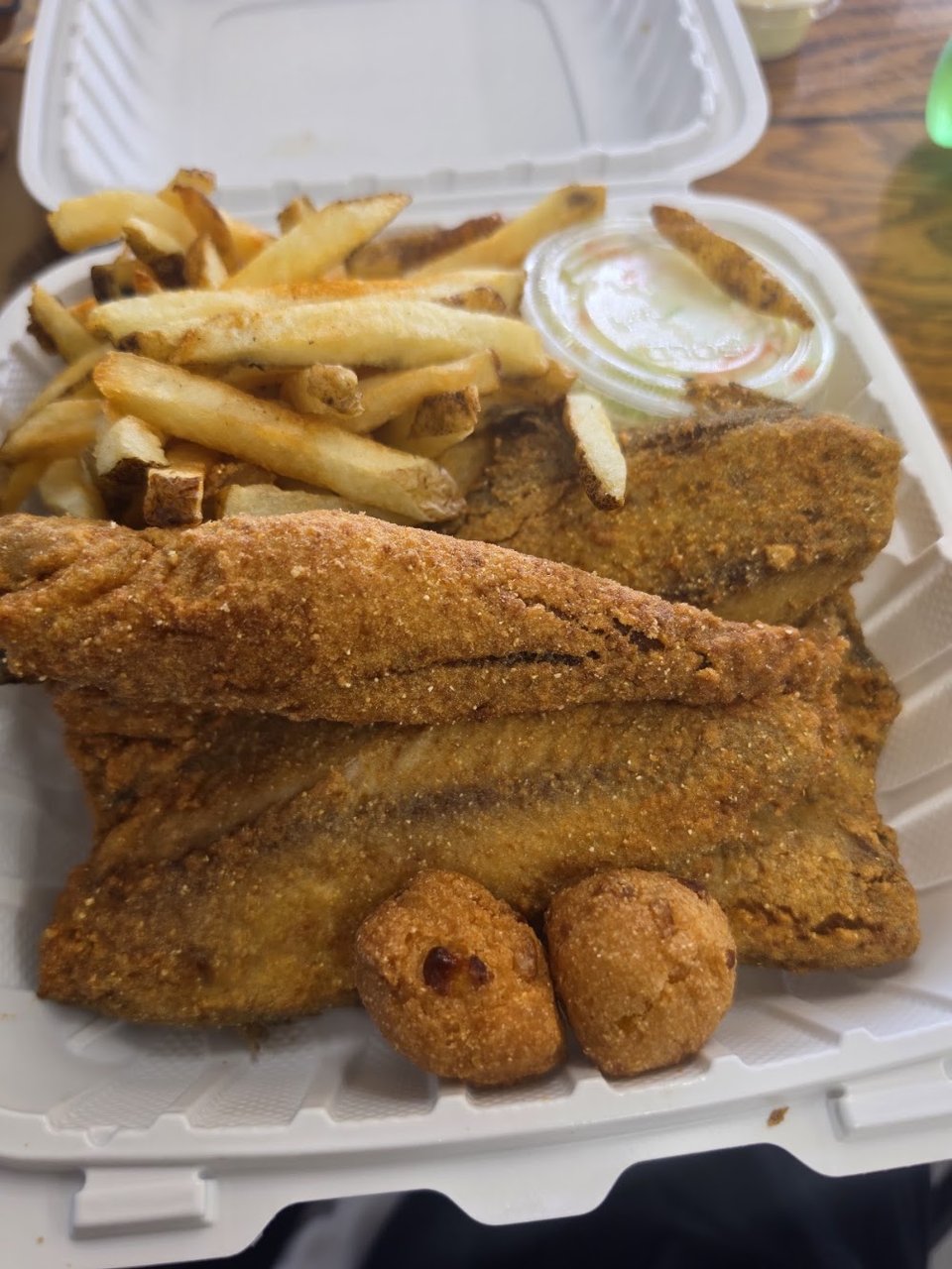 Printed menu with seafood specials.
