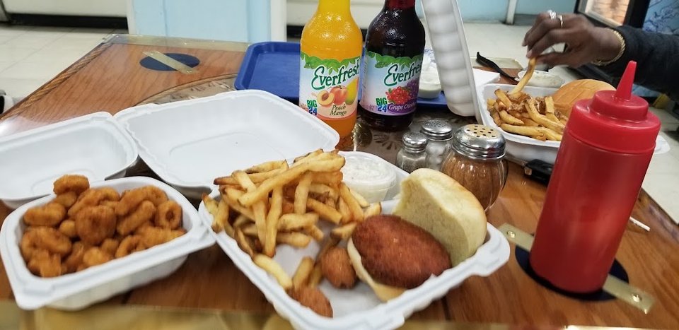 Menu page listing fish and shrimp platters.